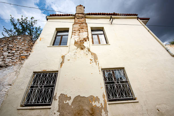 Worn out wall of old stone walled house