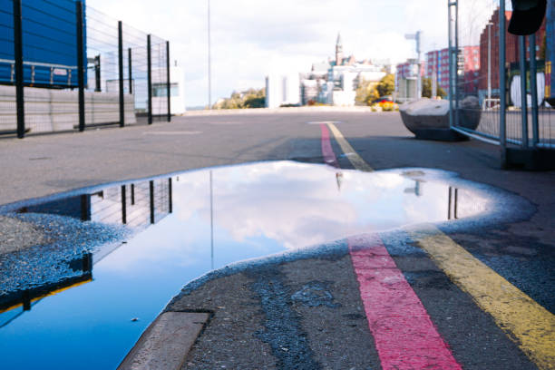 istock Close up of a puddle on asphalt 2177674005