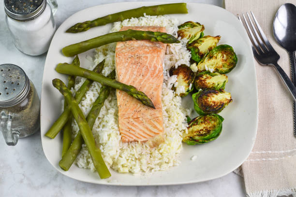 istock baked salmon  with rice and asparagus 2177674053