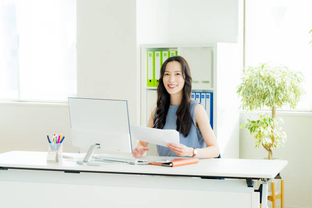 istock business woman working in the office 2177676566