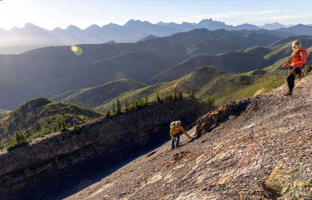 istock Aerial view of mature mountain climbers climbing ridge 2177677836