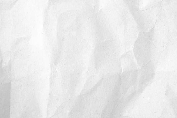 istock White recycled craft paper texture as background. Grey paper texture, Old vintage page or grunge vignette of old newspaper. Pattern rough art creased grunge letter. Hardboard with copy space for text. 2177680991