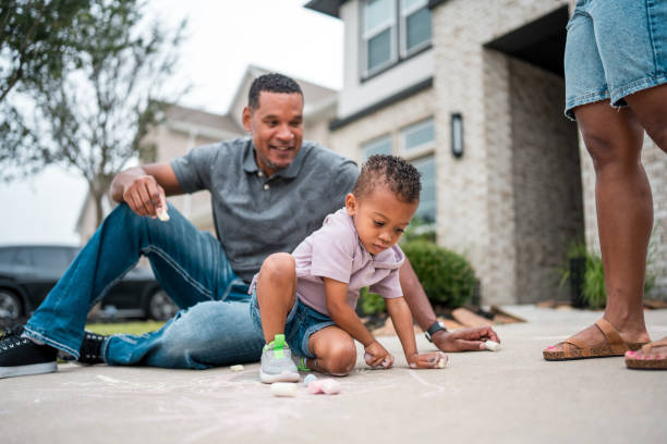 istock Diverse Father and Son Chalk Art Creation at Home 2177681126