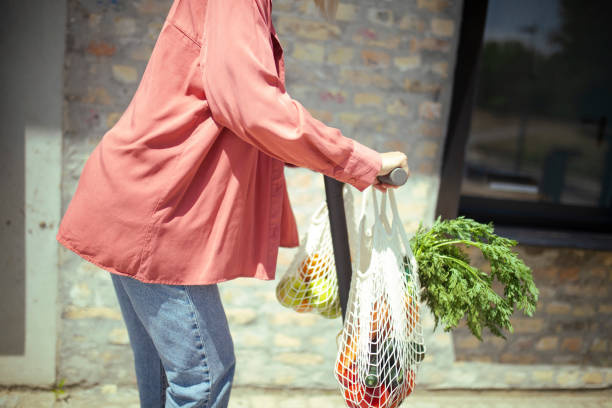 istock Side view of an unrecognizable woman riding an electric push sco 2177682993