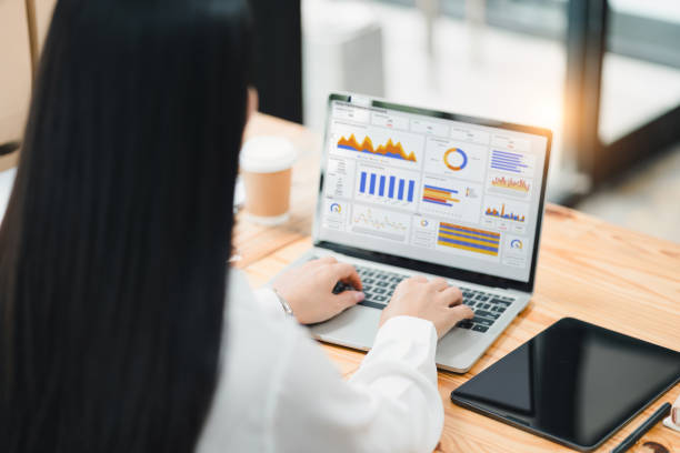 istock Business professional analyzing sales performance dashboard on laptop screen. 2177684440