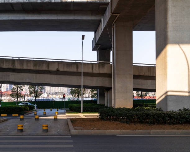 istock Concrete structure and asphalt road space under the overpass in the city 2177695407