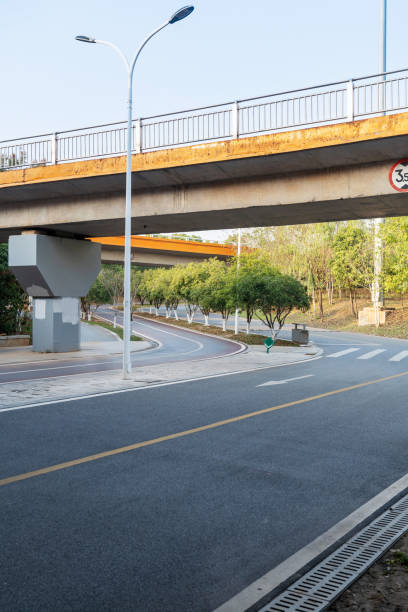 istock Concrete structure and asphalt road space under the overpass in the city 2177695472