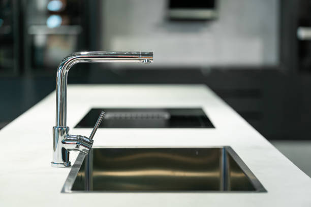 istock a sleek and modern kitchen sink and faucet set 2177702273