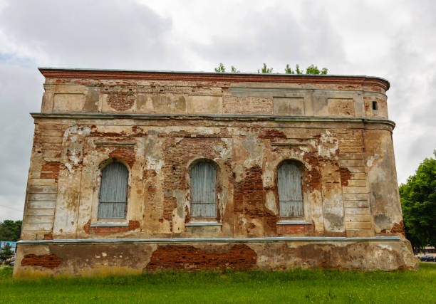Ruins of an old brick synagogue on a cloudy summer day in Bykhov, Mogilev region, Belarus