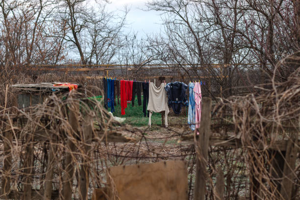 drying clothes on a clothesline in the yard of a village house