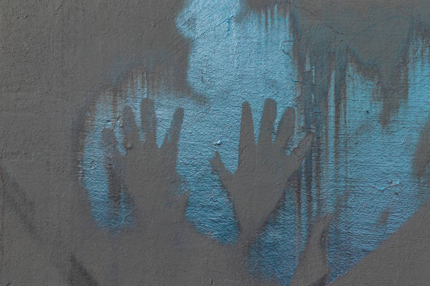 istock Abstract image of handprints on the wall 2177711435