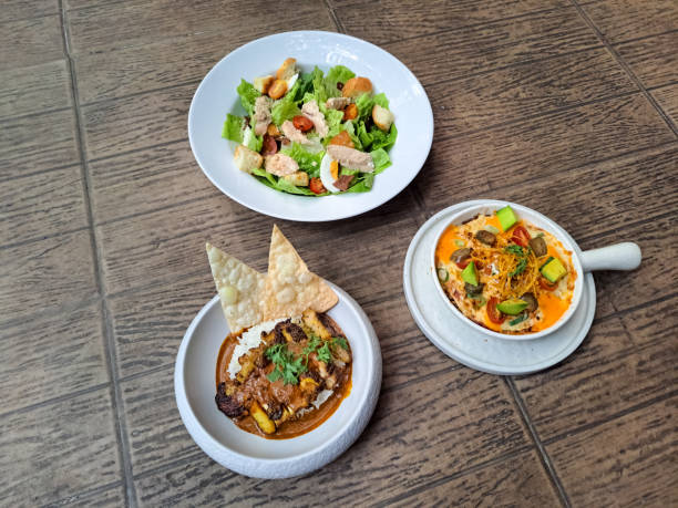 istock Chicken Tikka Masala With Enchiladas And Caesar Salad. Food Menu. 2177712182