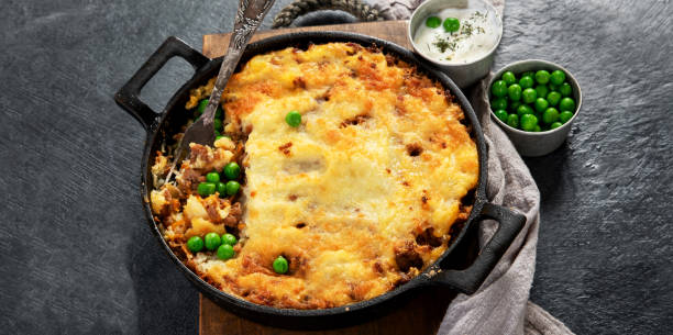 istock Shepherds Pie - ground meat with vegetables, topped with mashed potatoes, and cheese. Baked. 2177716275