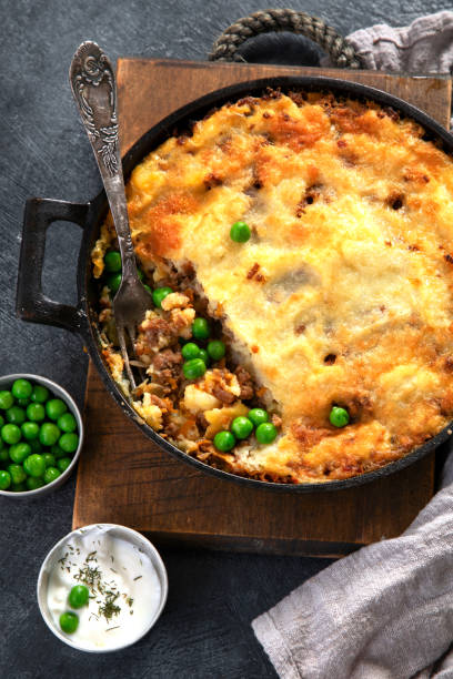 istock Shepherds Pie - ground meat with vegetables, topped with mashed potatoes, and cheese. Baked. 2177716295