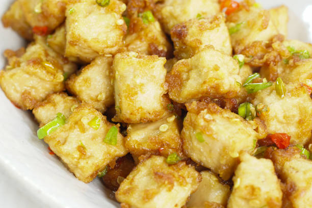 istock Stirred Tofu: Vegetarian Asian Style.This vibrant dish features crispy stir-fried tofu, perfectly marinated for flavor and texture. 2177716486