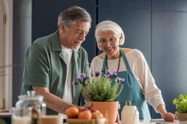 istock Elderly Couple Engaged in Gardening 2177719003