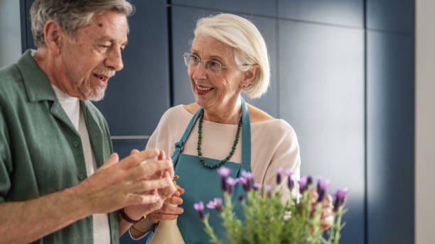 istock Senior Couple Gardening Indoors 2177719028