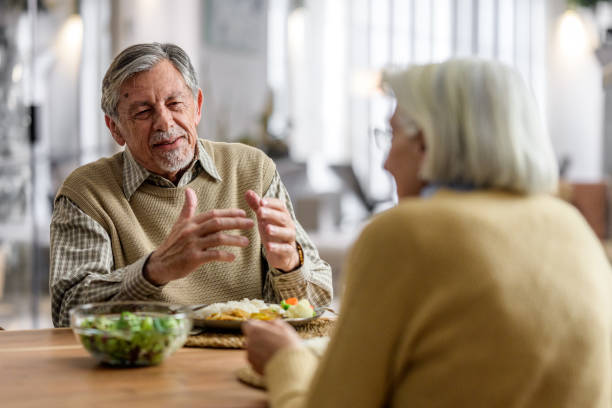 istock Senior Couple Dining at Home 2177719046