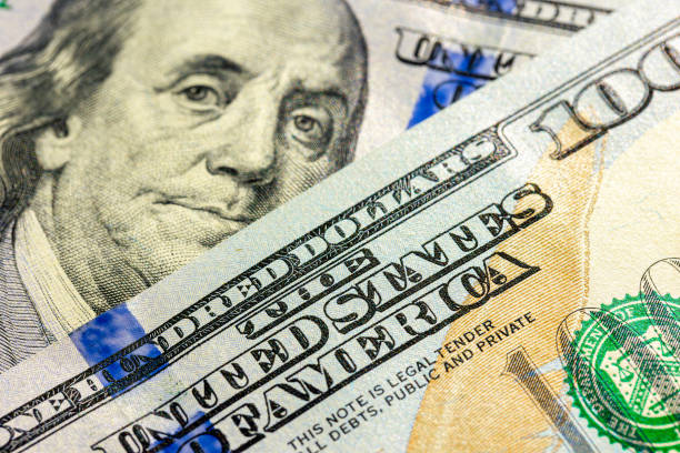 istock Close-up image of Benjamin Franklin on 100 bill. Finance concept. 2177719740
