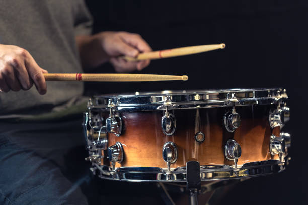istock A man plays a drum. Drumsticks are hit on the drum. 2177720602