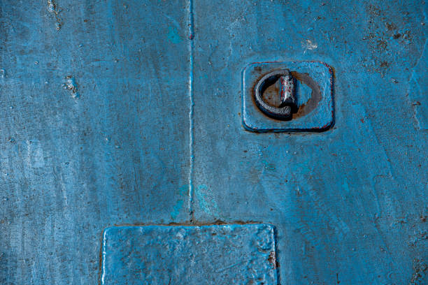 rusting anchor on an iron ship