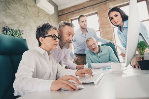 istock Photo of teamwork startup partners people meeting networking computer comfortable nice creative startup office loft room interior 2177722438