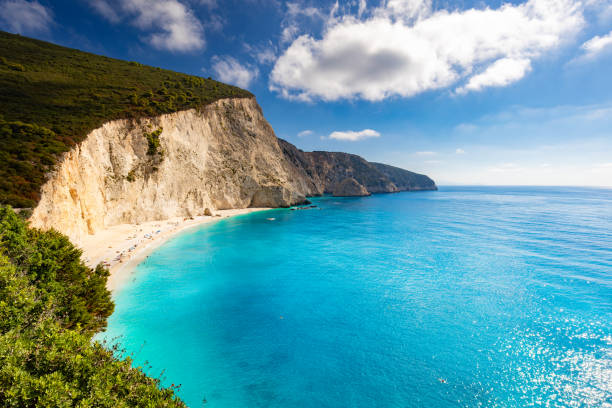istock Summer landscape with a sandy beach next to a high cliff 2177722532
