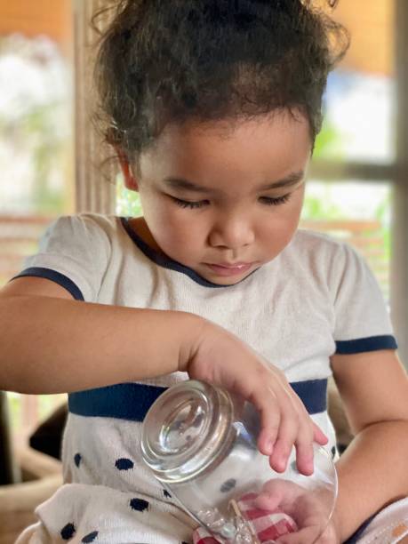 istock Cute Asian little girl playing at home. 2177724069