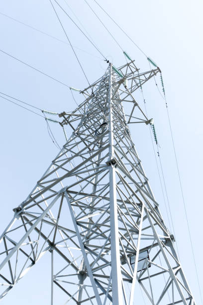 istock High-voltage power line support against the blue sky 2177728617