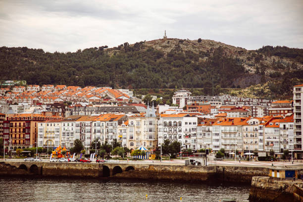 istock Coastal Town with Red Rooftops and Scenic Hills 2177730863