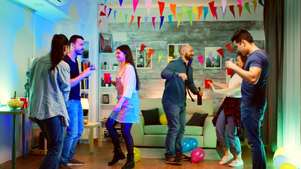 istock Group of young people dancing together at a party 2177732890
