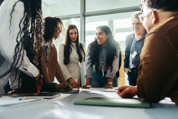 istock Diverse team brainstorming during a business meeting in a modern office 2177741906