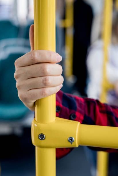 istock hand gripping handrail in public transportation 2177743543
