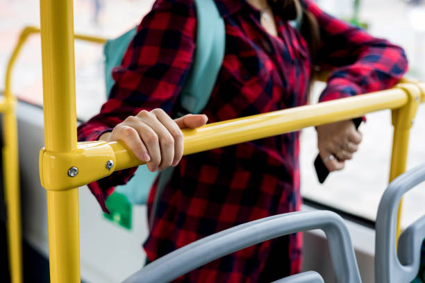 istock woman's hand holds onto a handrail 2177743547