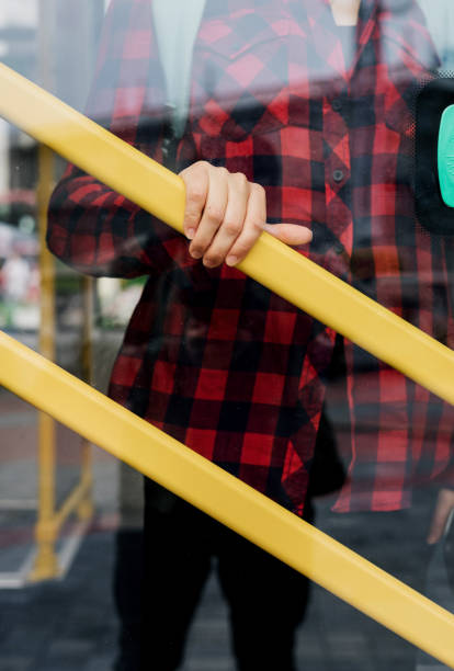 istock female hand holding a metal handrail 2177743557