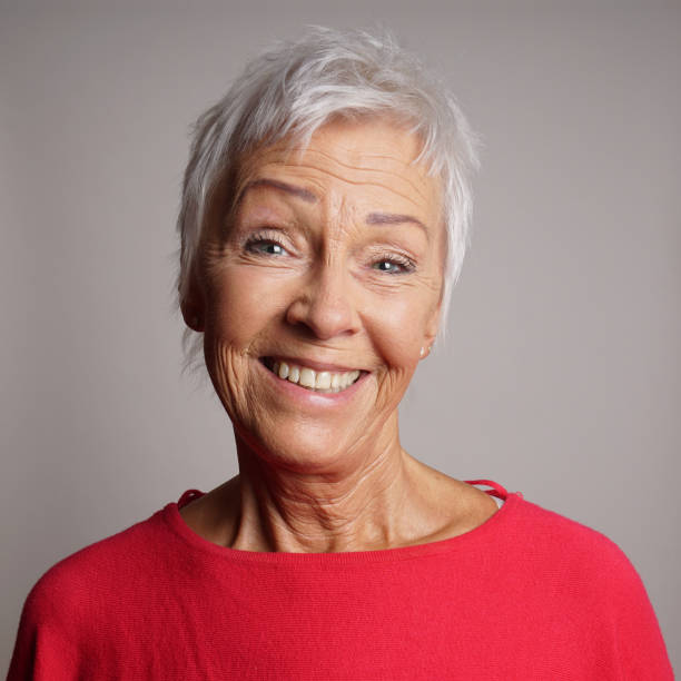 istock happy older woman in her 60s 2177746359
