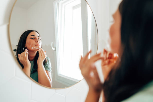 istock woman using make up in the bathroom 2177746775