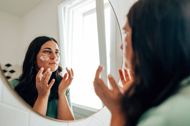istock woman using make up in the bathroom 2177746955
