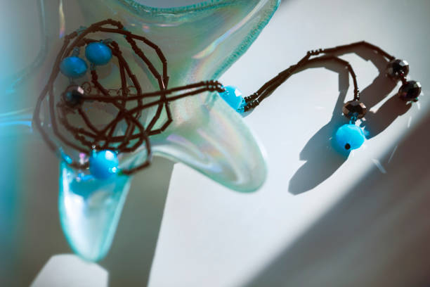 A blue set of an elegant women's necklace in a beautiful decorative bowl in the shape of a starfish