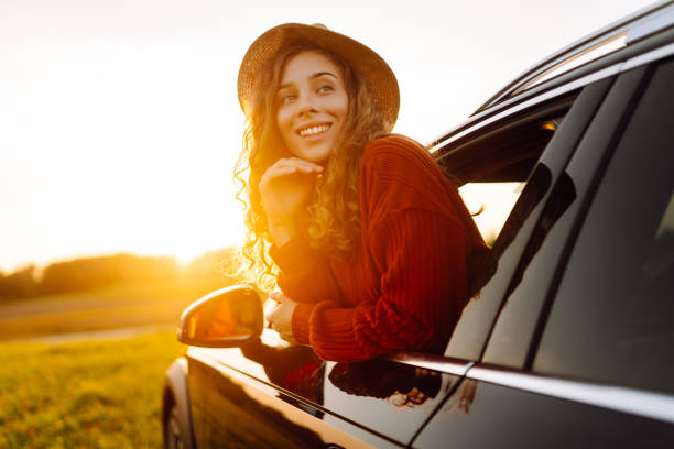 istock Relaxed woman on summer road trip enjoying window view. 2177756711