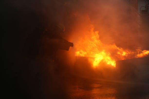 Fire explosion flammable car fire on street smoke, hot danger flame burning effect. Fire burn car accident disaster conflagration. Arson disaster burning fire flame high heat almost explode.