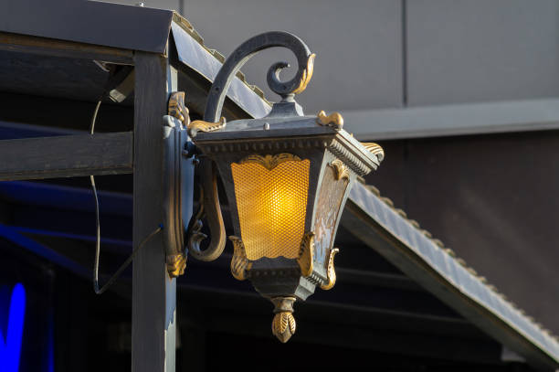 istock A lamp post with a yellow light shining on it 2177766923
