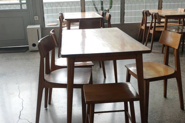 istock wooden tables and chairs, empty tables, empty space, sunlight from the front 2177768187