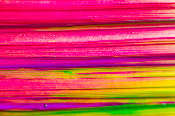 An abstract illustration of a vibrant multi-colored lines close-up on a wall