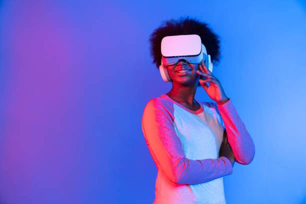 istock Profile thinking beautiful African wearing VR glasses metaverse. Contrivance. 2177772413