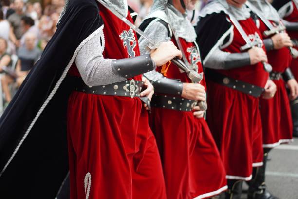 Valencia, spain; 10- 09-2024: traditional festival of moors and christians, Valencia, Spain. faceless dragon knights with cape and sword costume