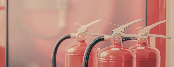 istock The red fire extinguisher is ready for use in case of an indoor fire emergency. 2177775561