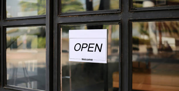 istock a sign that says open is on a door 2177775611