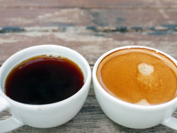 istock Two coffee cup, Americano coffee and espresso coffee on wooden table 2177776629
