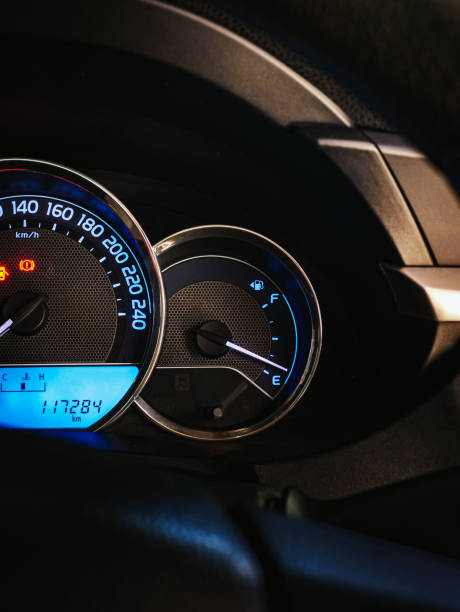 warning light, close up of warning light on car dashboard stock photo